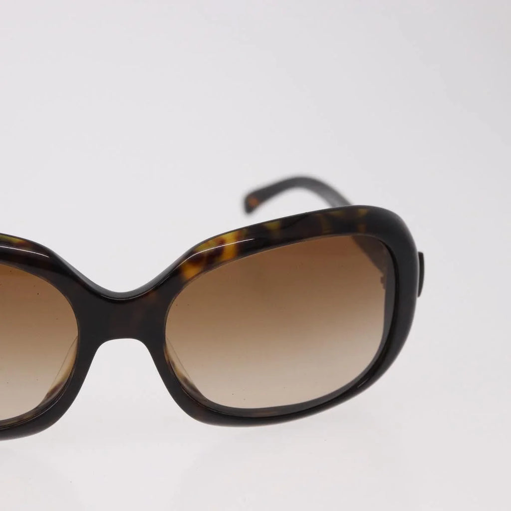 Chanel Tortoise Sunglasses with CC Bow Detail — Ribbon Motif, Silver Hardware