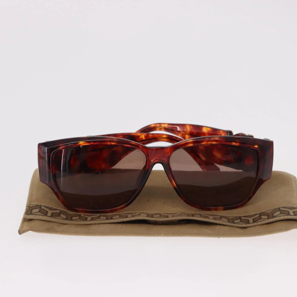 Yves Saint Laurent Vintage Tortoise Sunglasses — Sculptural Logo Hinge
