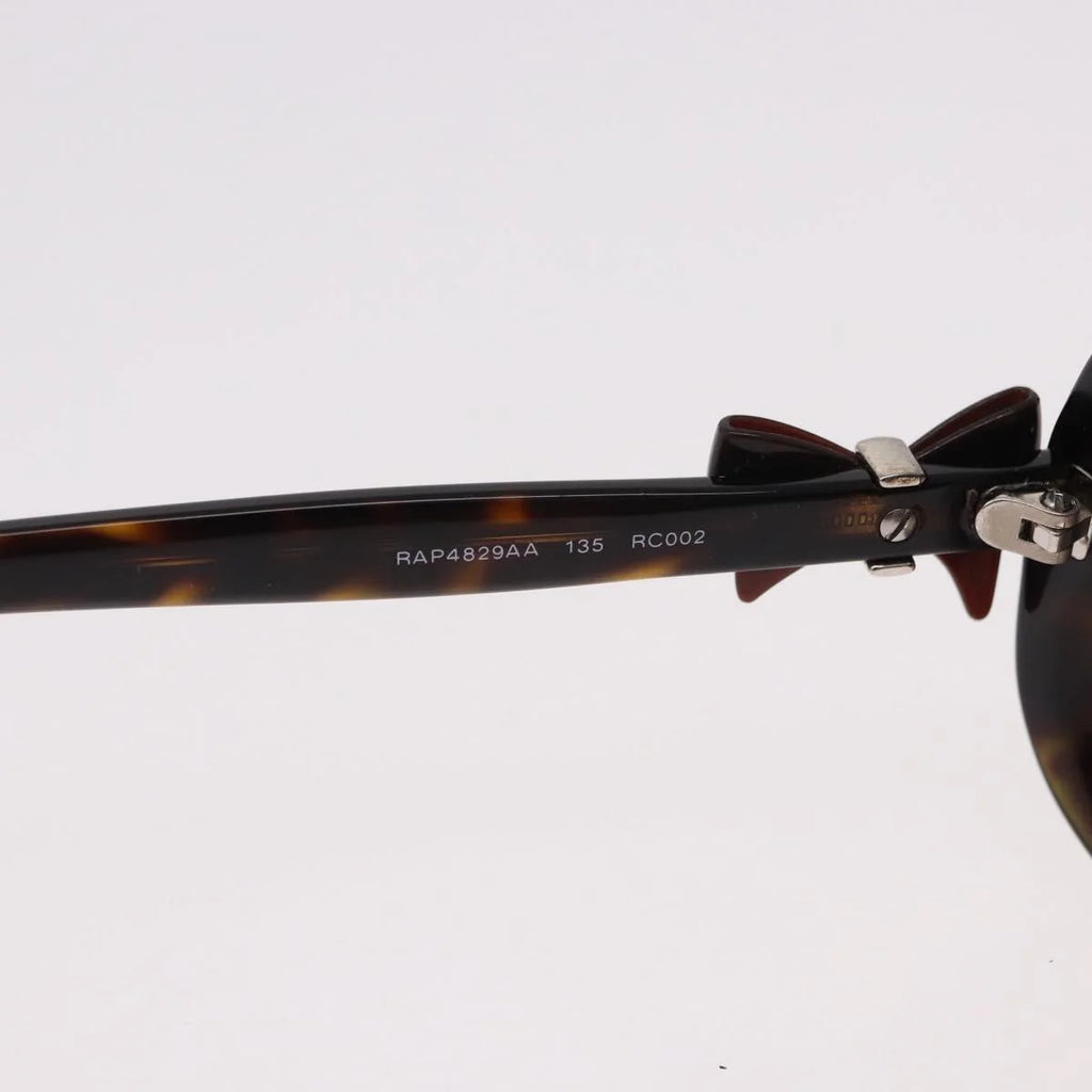 Chanel Tortoise Sunglasses with CC Bow Detail — Ribbon Motif, Silver Hardware