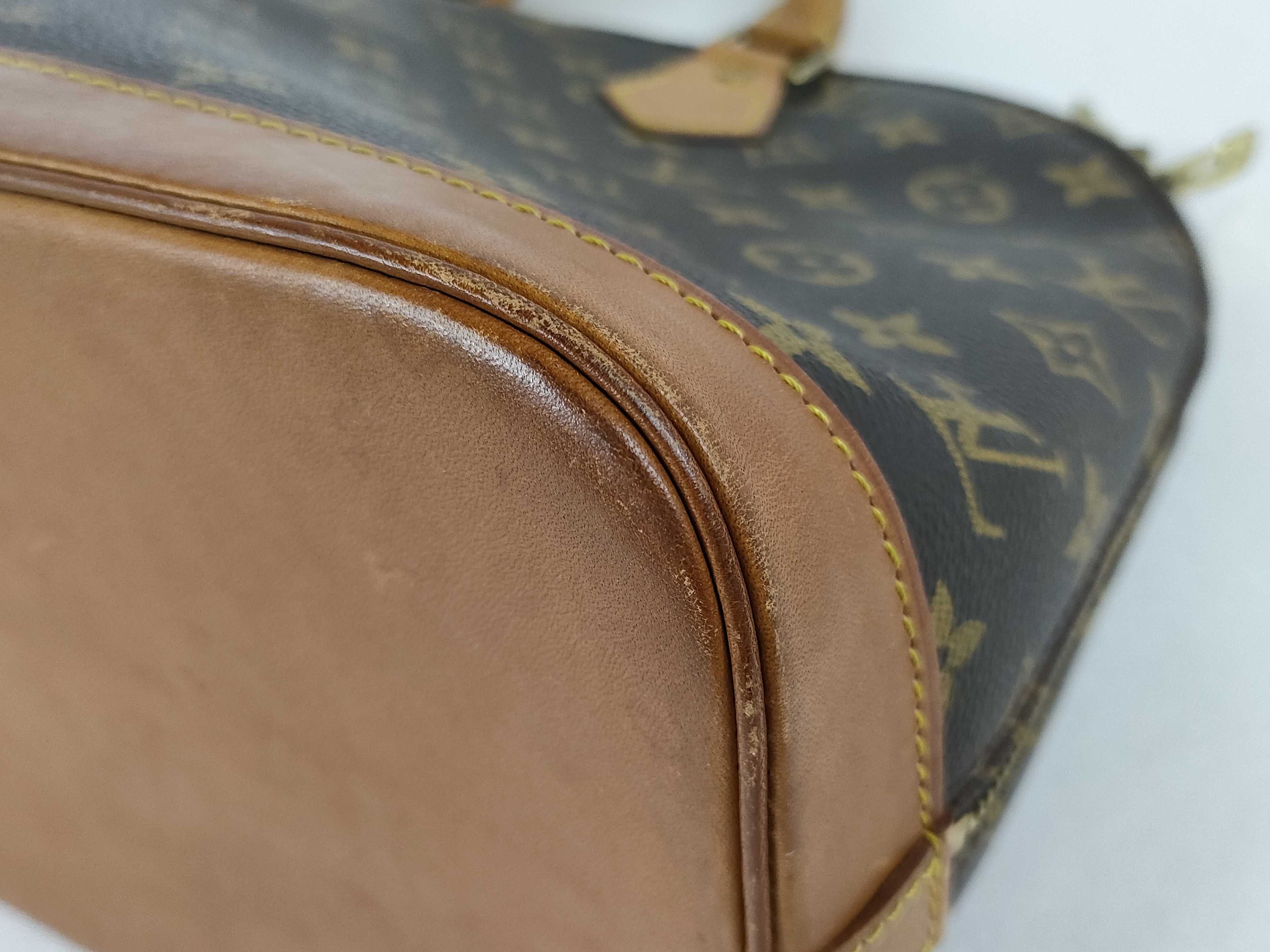Louis Vuitton Alma MM Monogram Bag