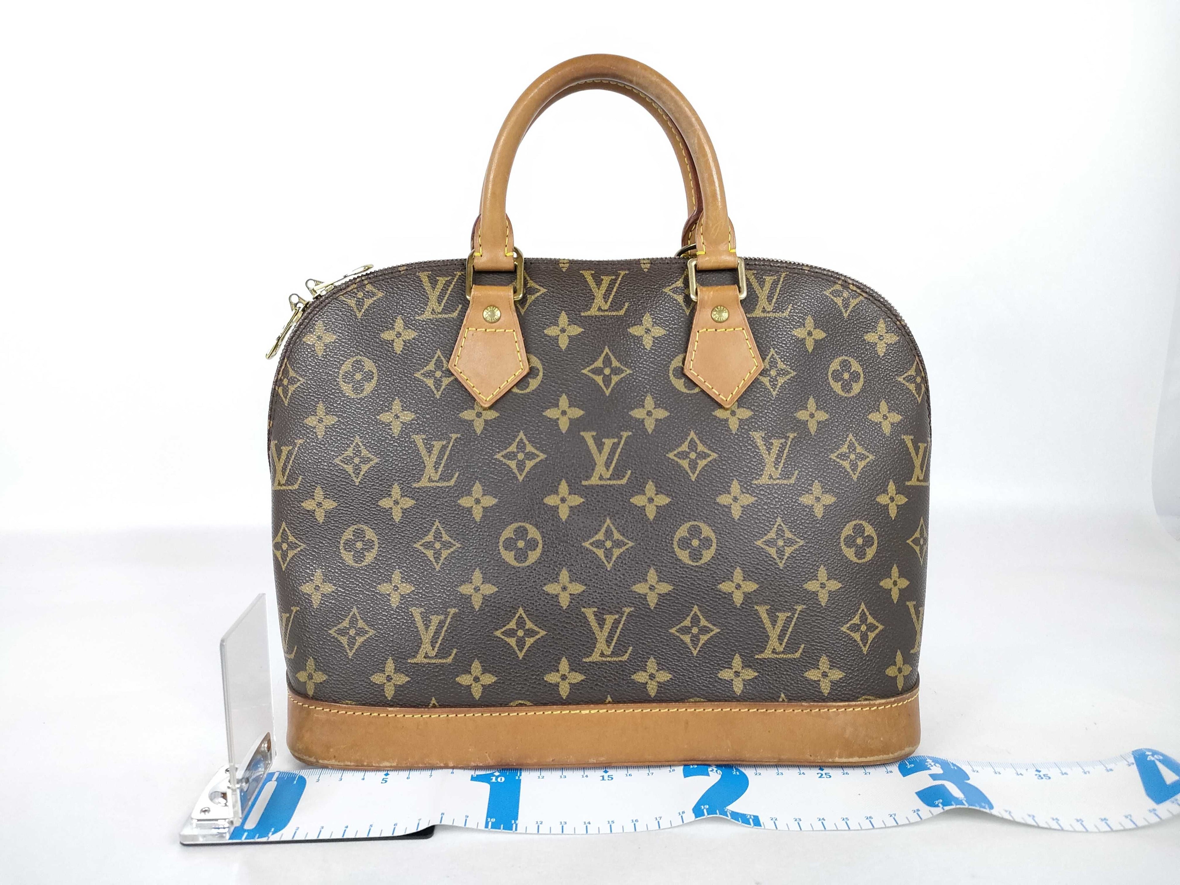 Louis Vuitton Alma MM Monogram Bag