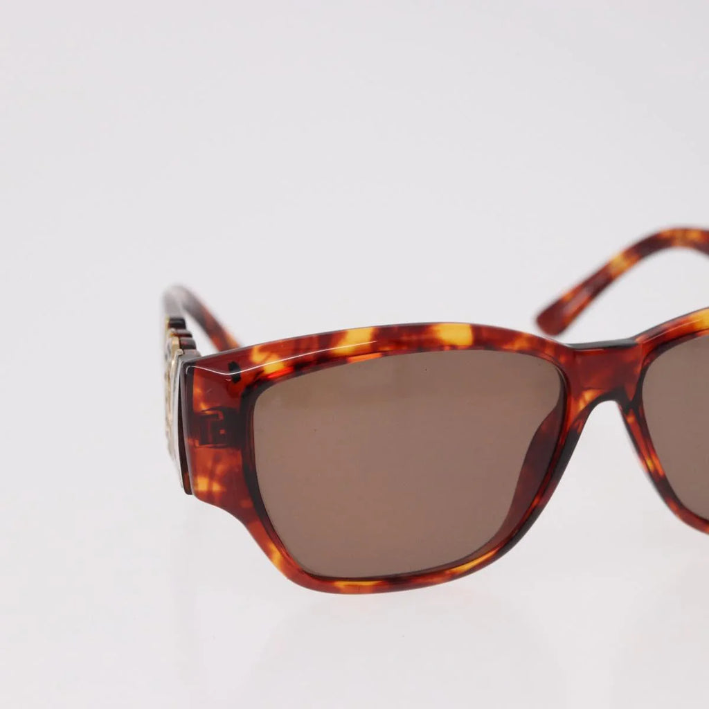 Yves Saint Laurent Vintage Tortoise Sunglasses — Sculptural Logo Hinge