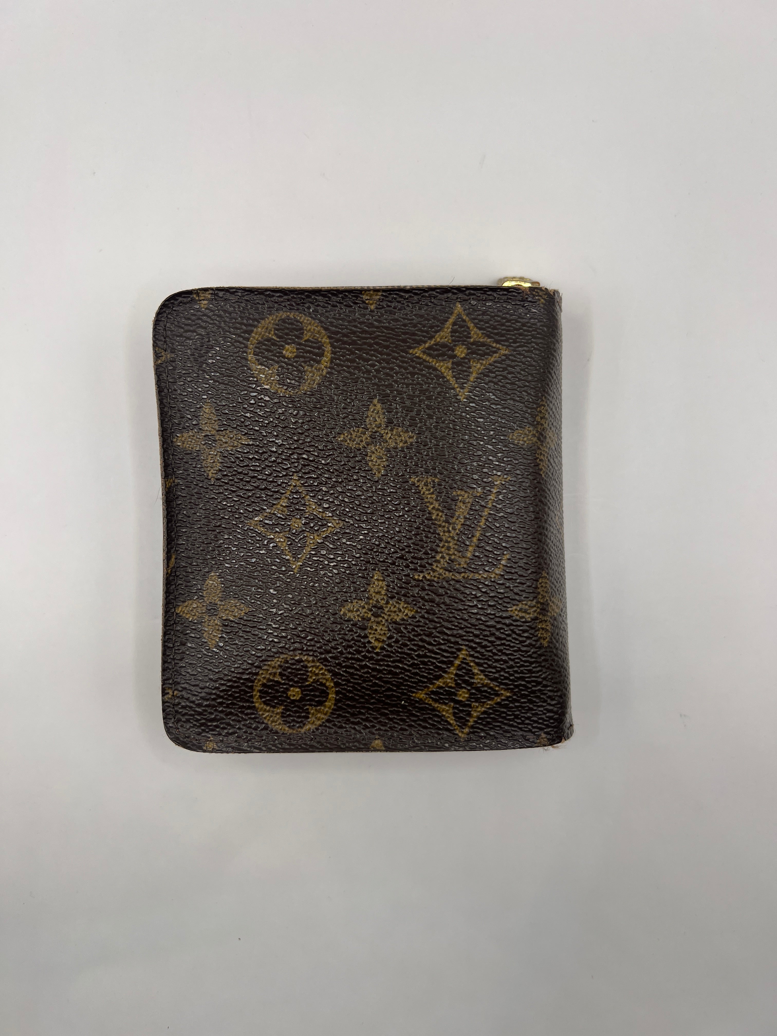 Louis Vuitton monogram compact wallet with snap closure