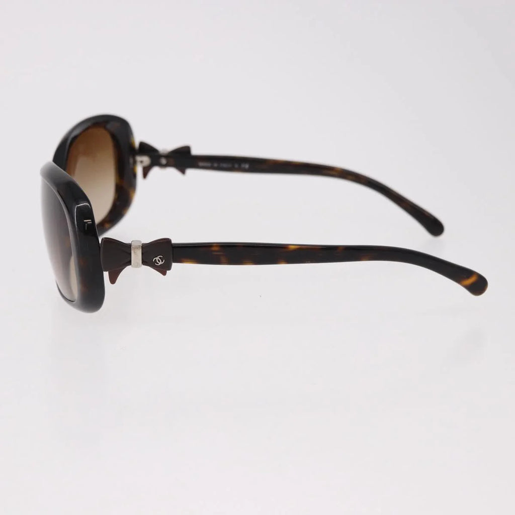 Chanel Tortoise Sunglasses with CC Bow Detail — Ribbon Motif, Silver Hardware