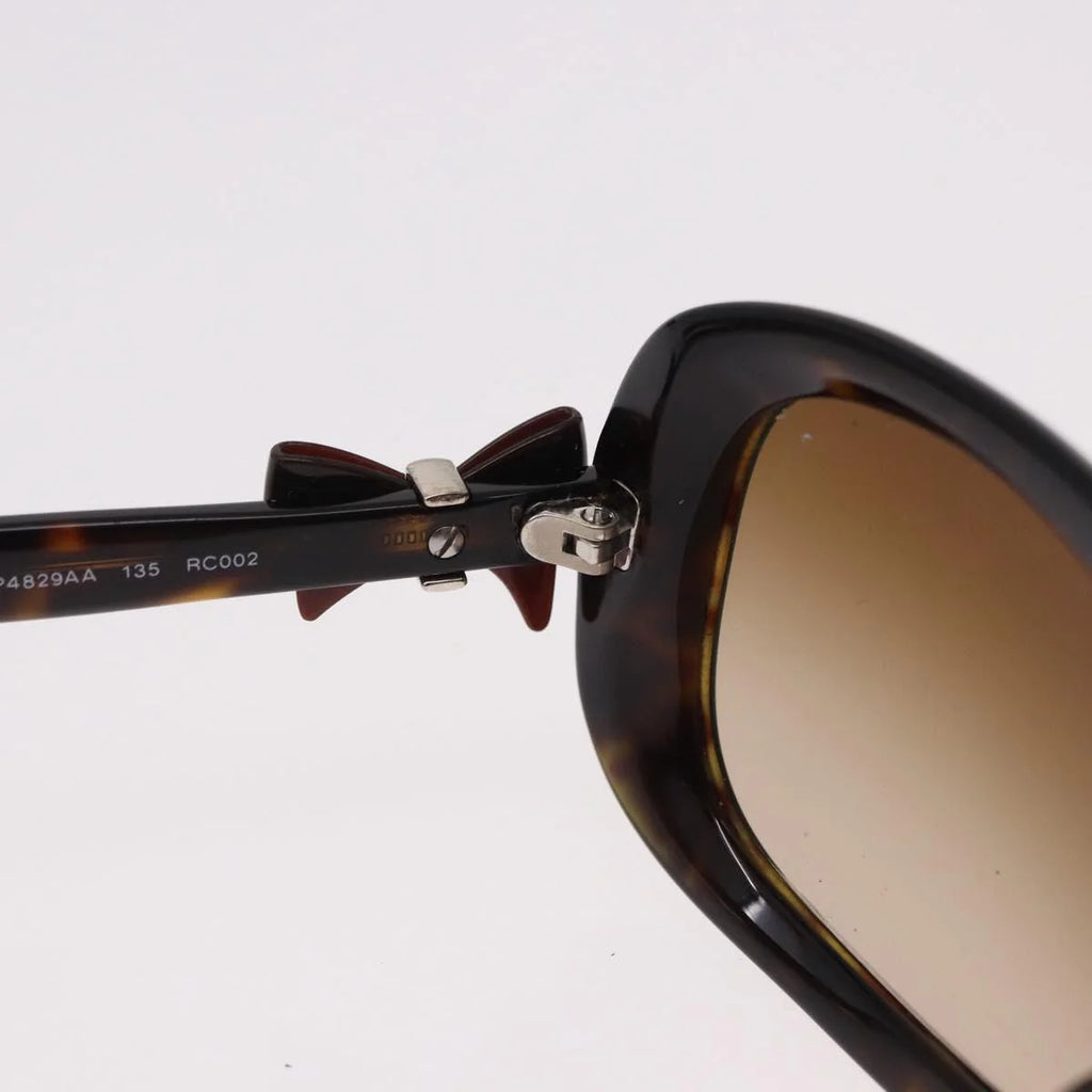 Chanel Tortoise Sunglasses with CC Bow Detail — Ribbon Motif, Silver Hardware