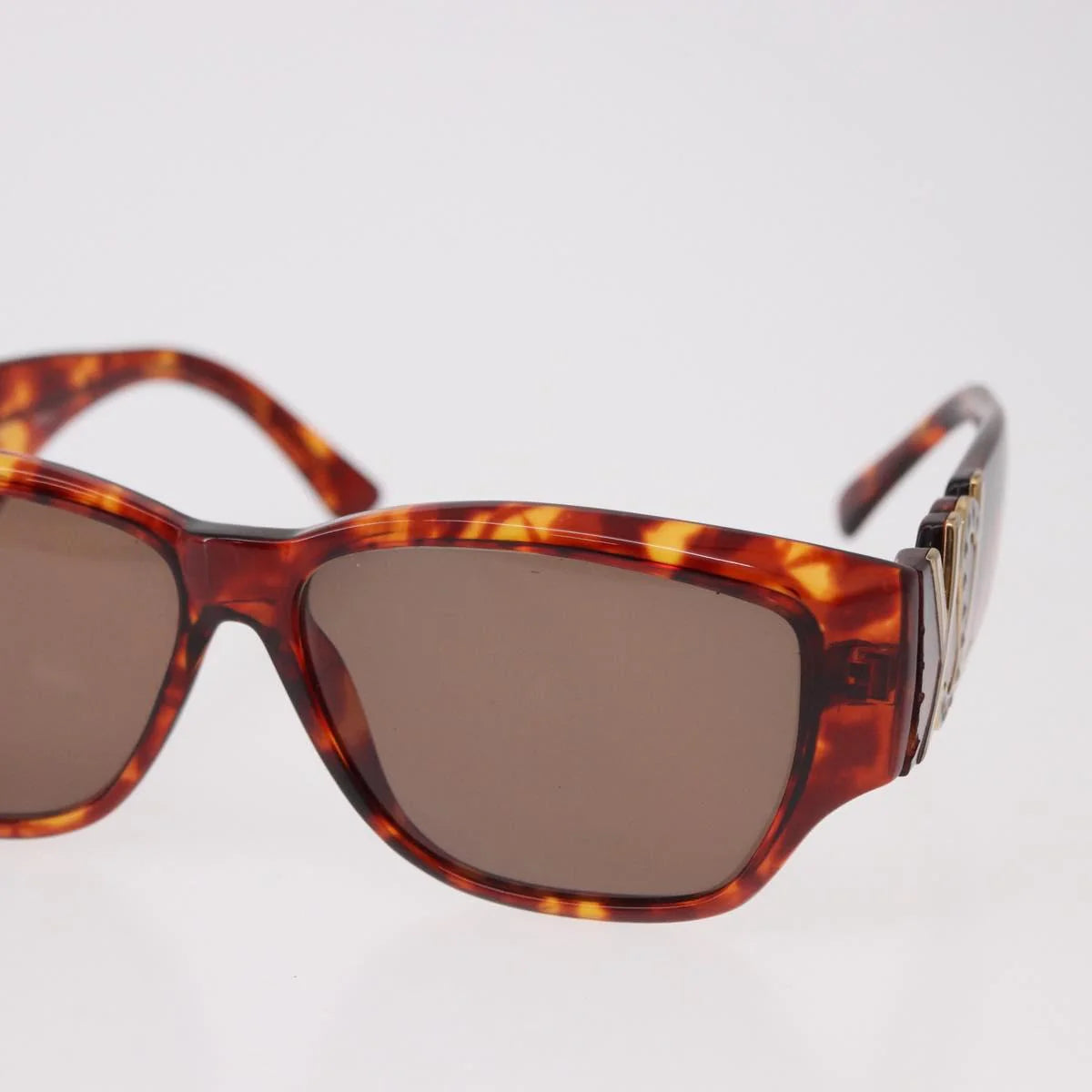 Yves Saint Laurent Vintage Tortoise Sunglasses — Sculptural Logo Hinge