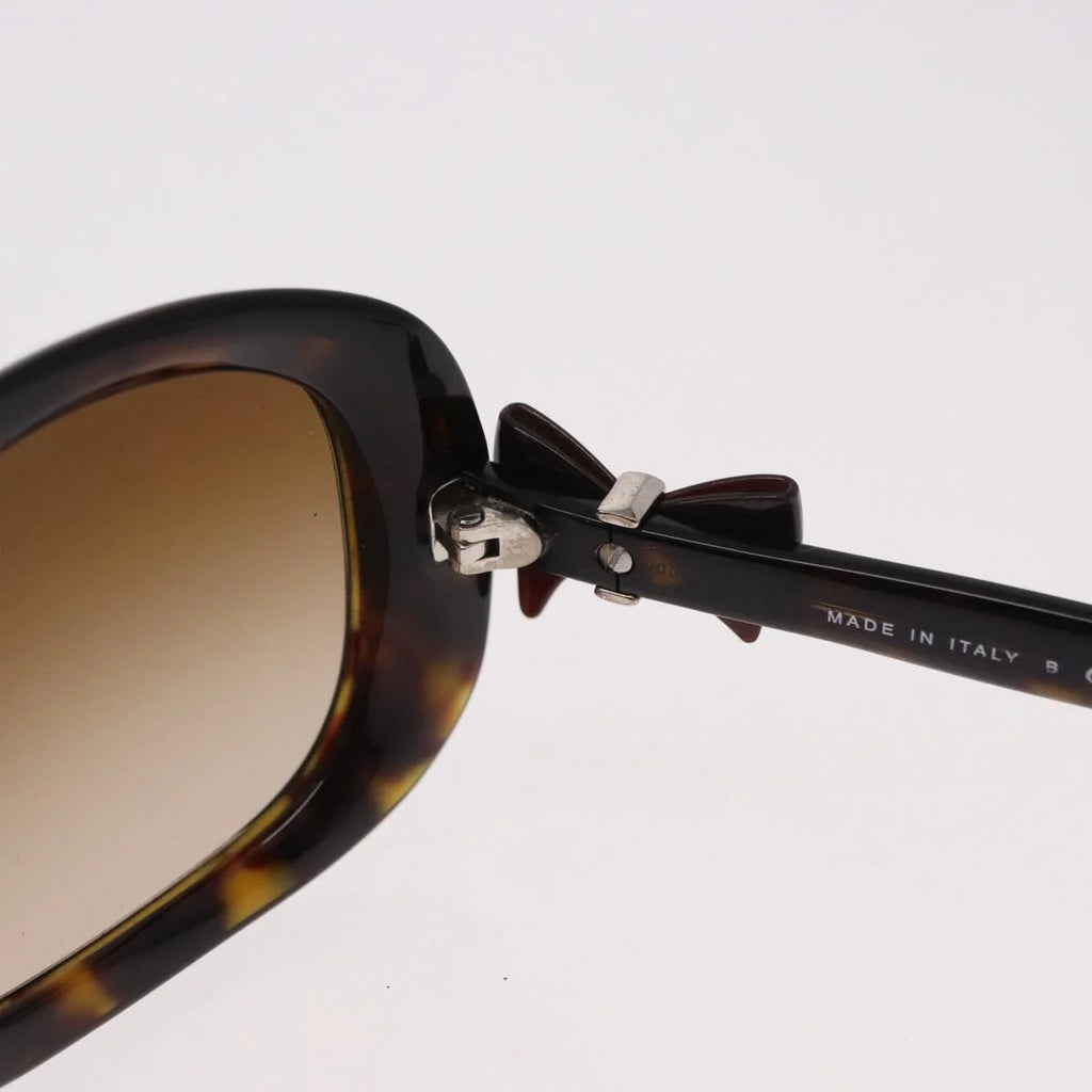 Chanel Tortoise Sunglasses with CC Bow Detail — Ribbon Motif, Silver Hardware