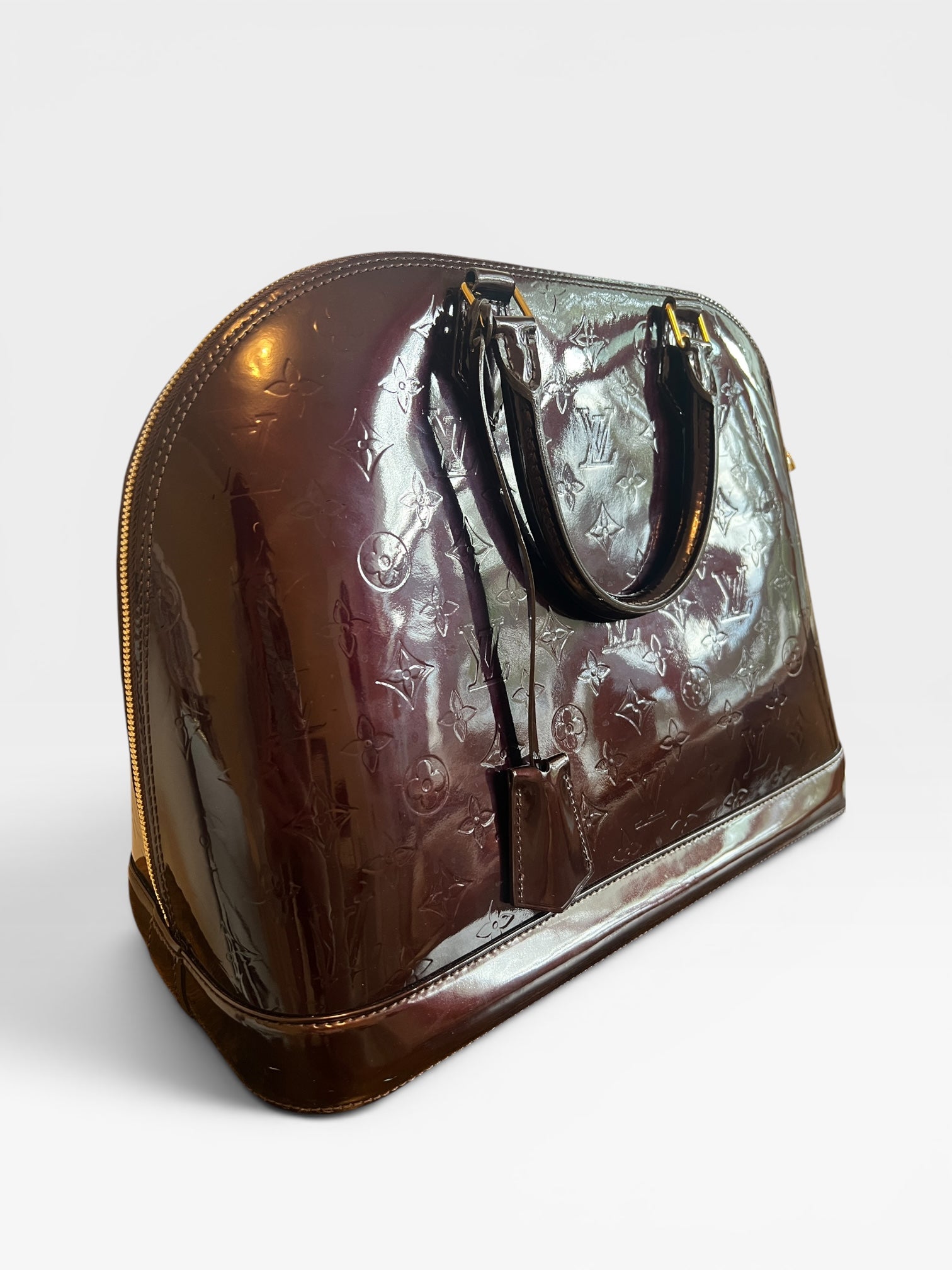 Louis Vuitton Alma GM Monogram Vernis in Amarante