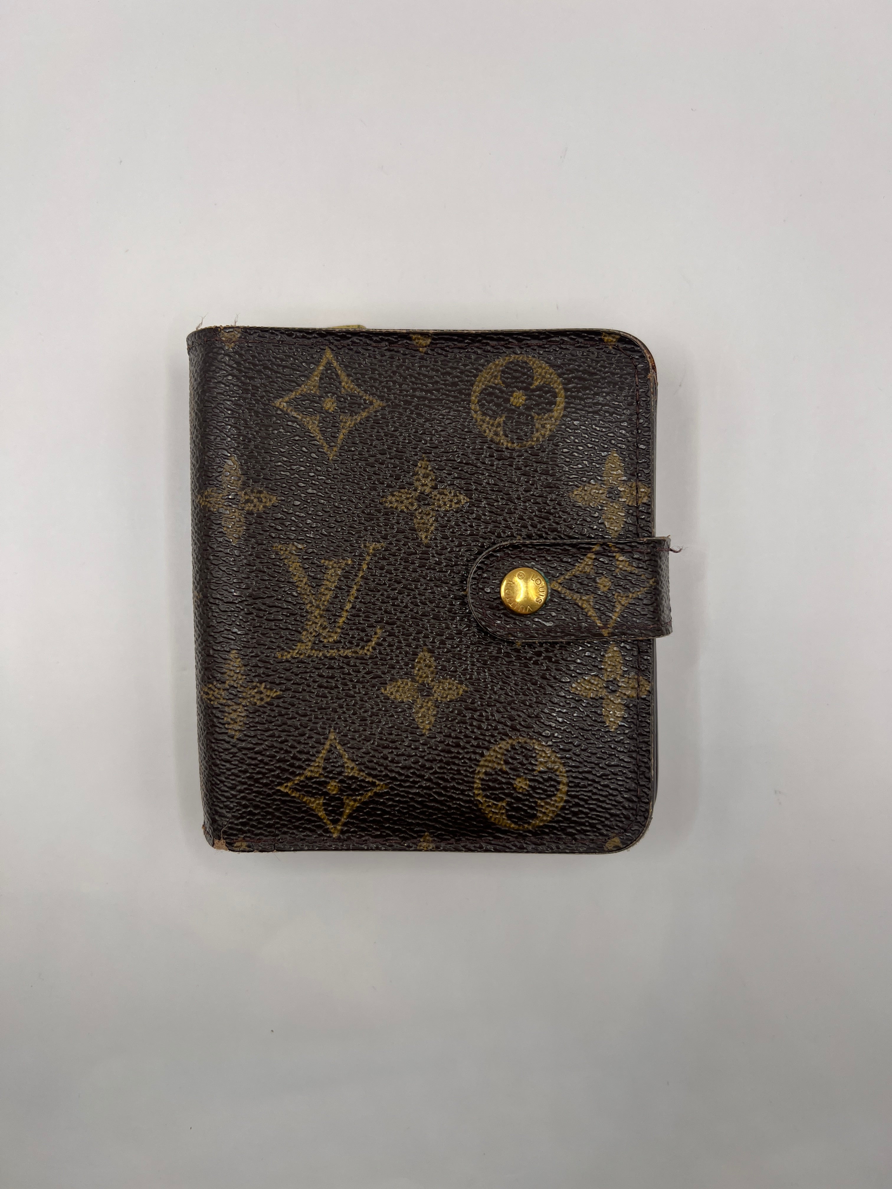 Louis Vuitton monogram compact wallet with snap closure