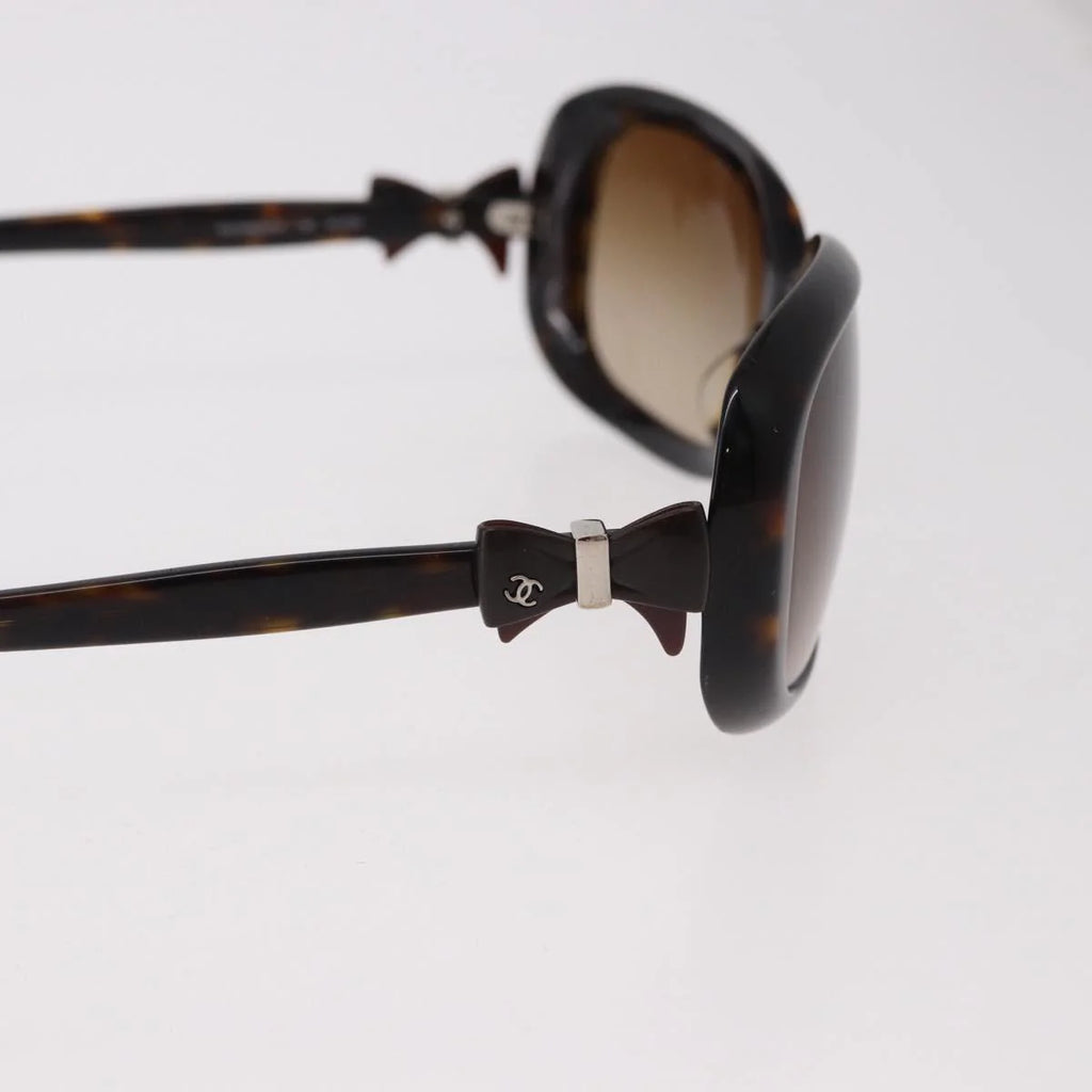 Chanel Tortoise Sunglasses with CC Bow Detail — Ribbon Motif, Silver Hardware