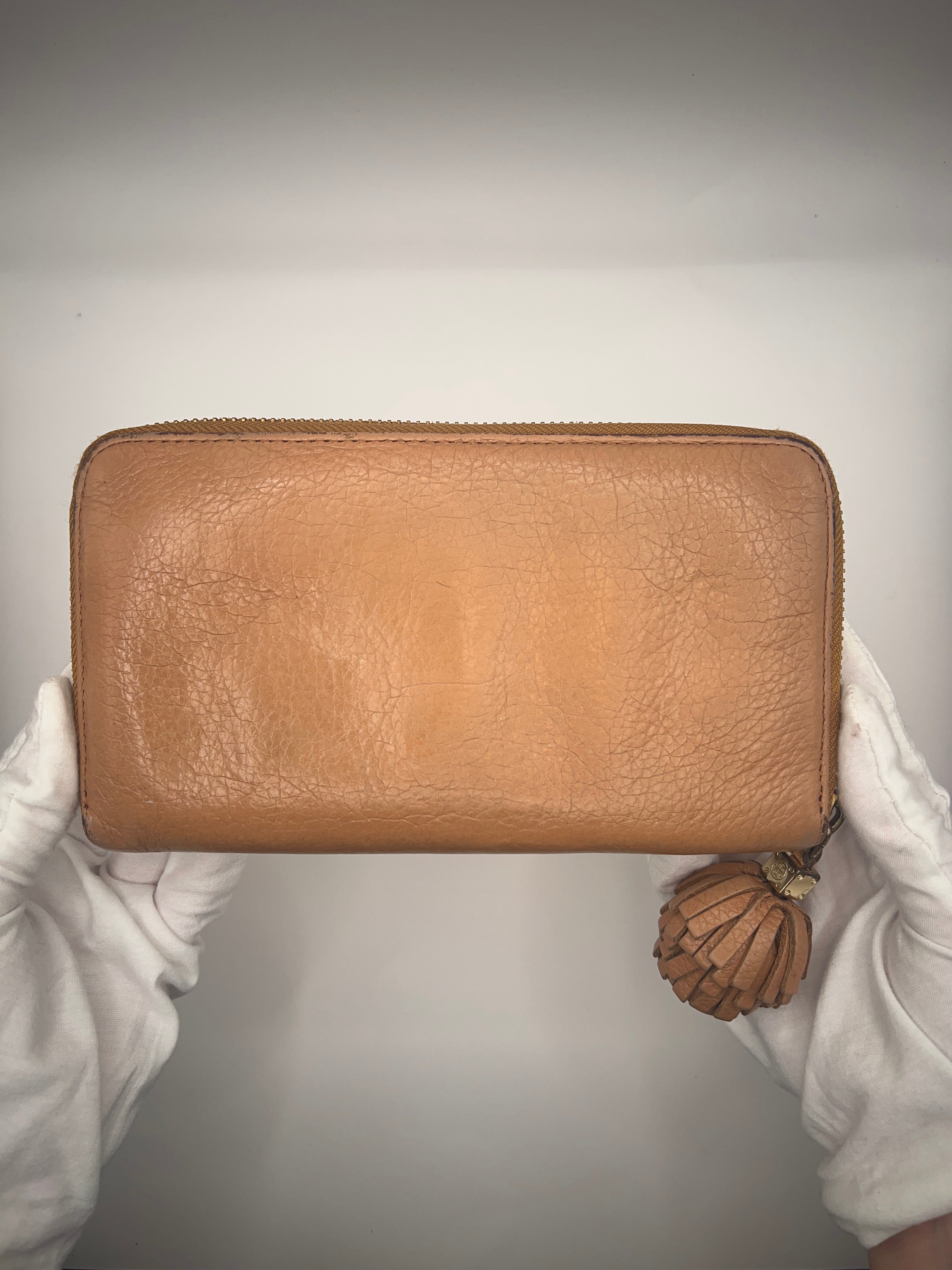 Tory Burch Pebbled Leather Tassel Zip Wallet