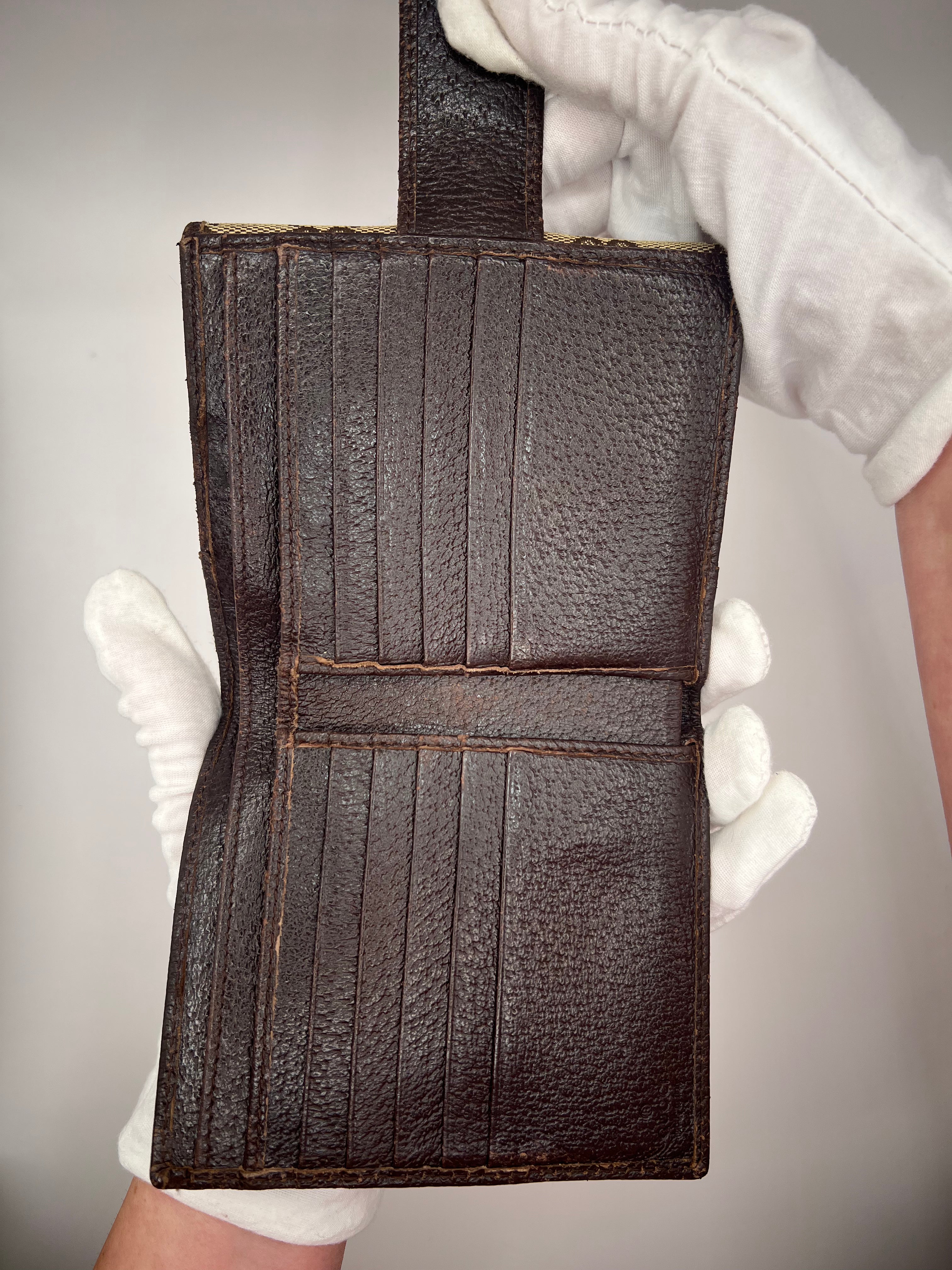 Gucci GG Supreme Canvas Bifold Wallet with Silver Logo Bar