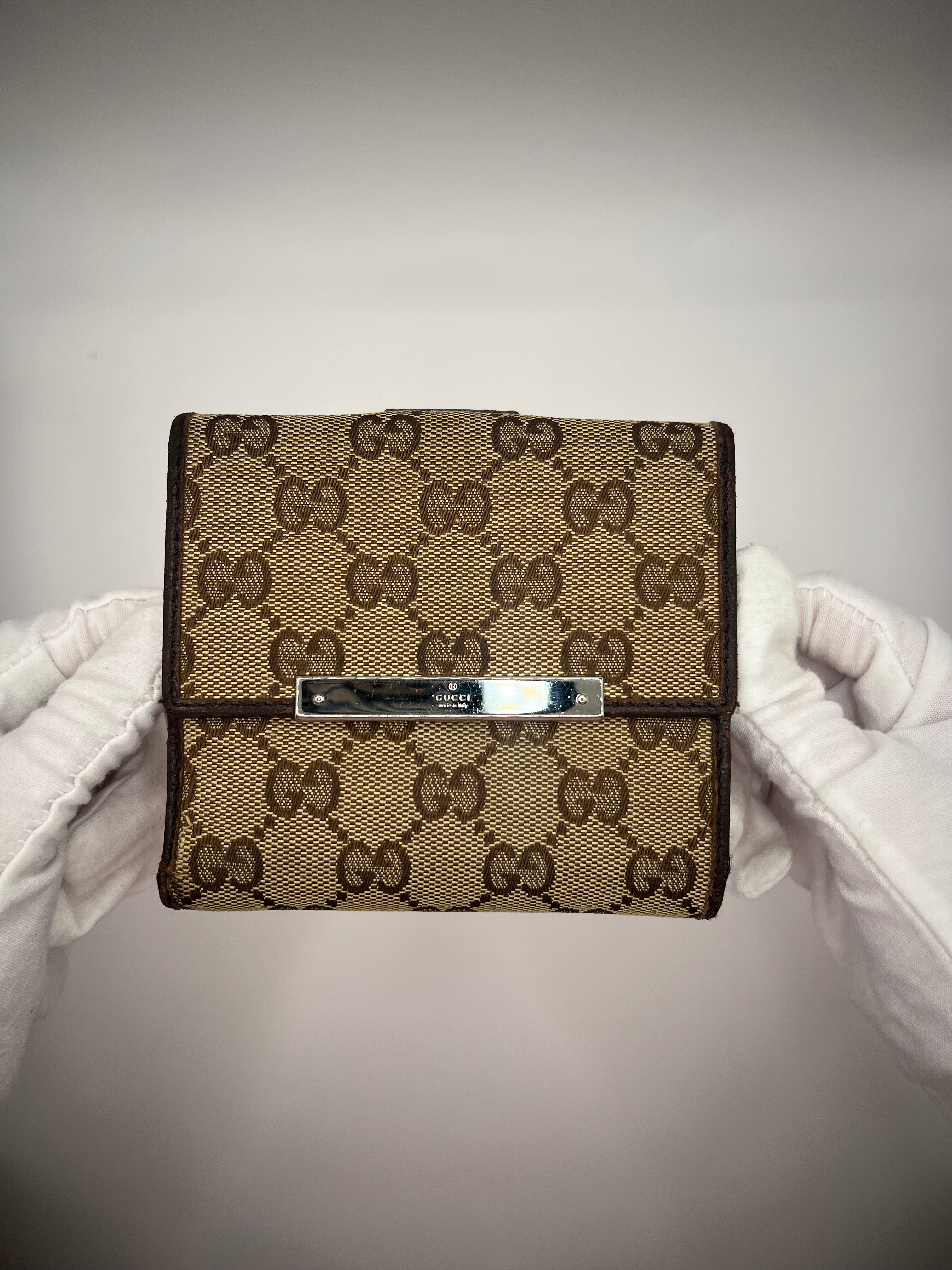 Gucci GG Supreme Canvas Bifold Wallet with Silver Logo Bar