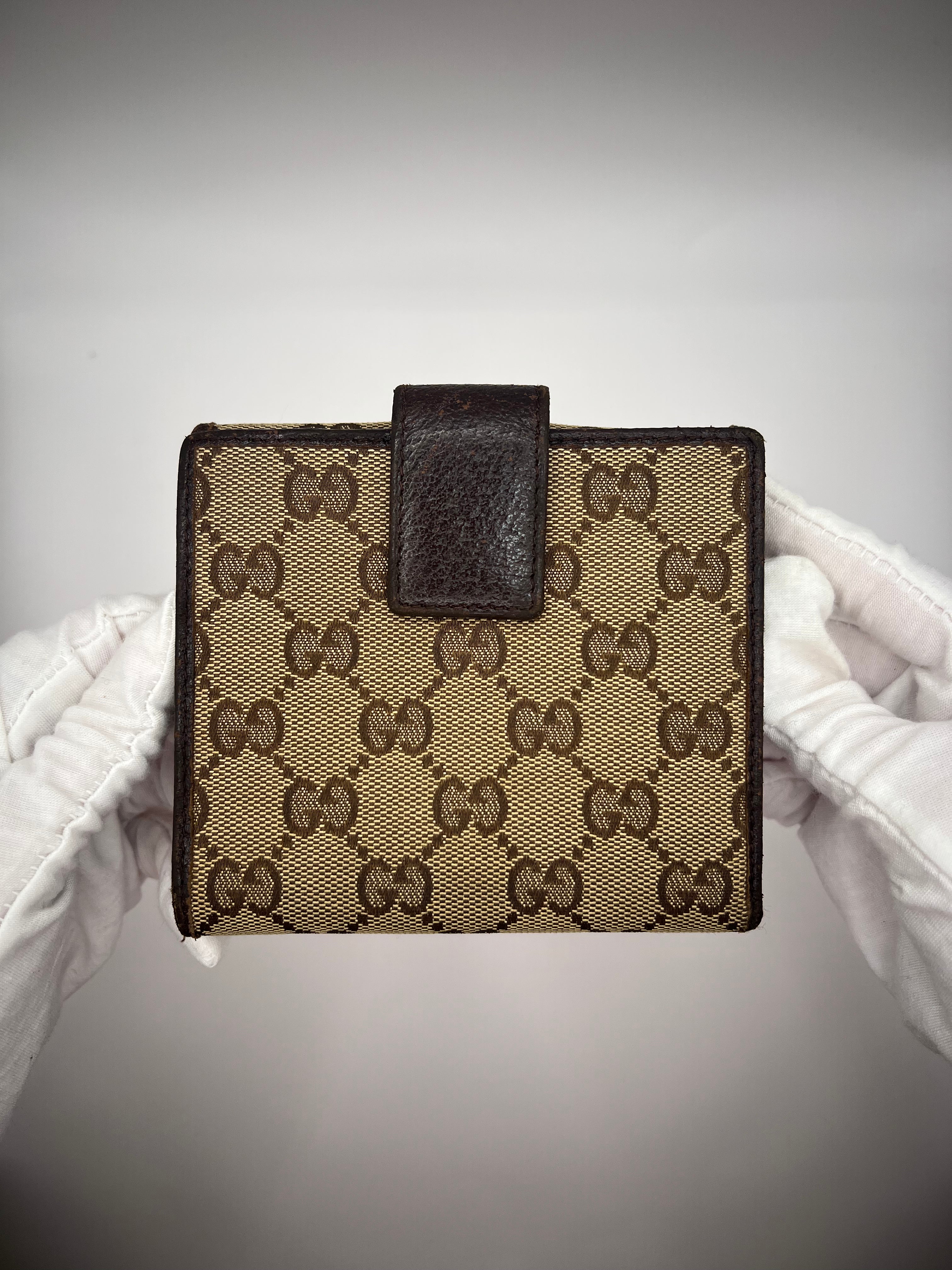 Gucci GG Supreme Canvas Bifold Wallet with Silver Logo Bar