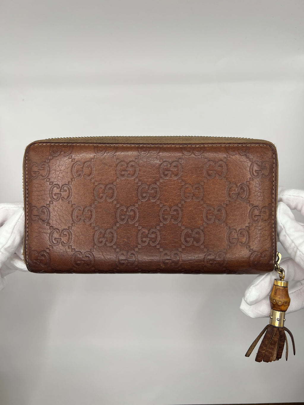 Gucci Guccissima Leather Zip-Around Wallet with bamboo tassel pull