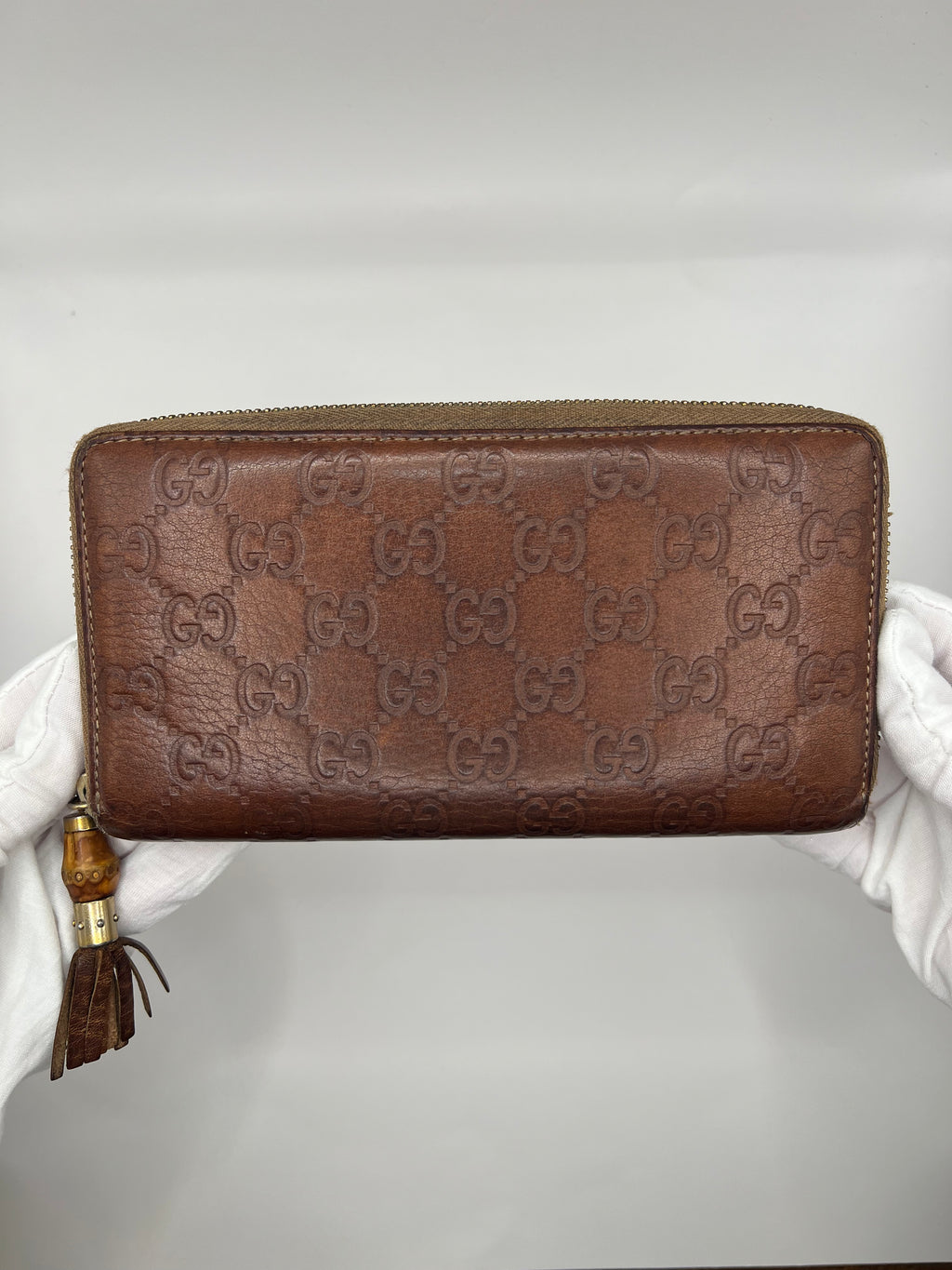 Gucci Guccissima Leather Zip-Around Wallet with bamboo tassel pull