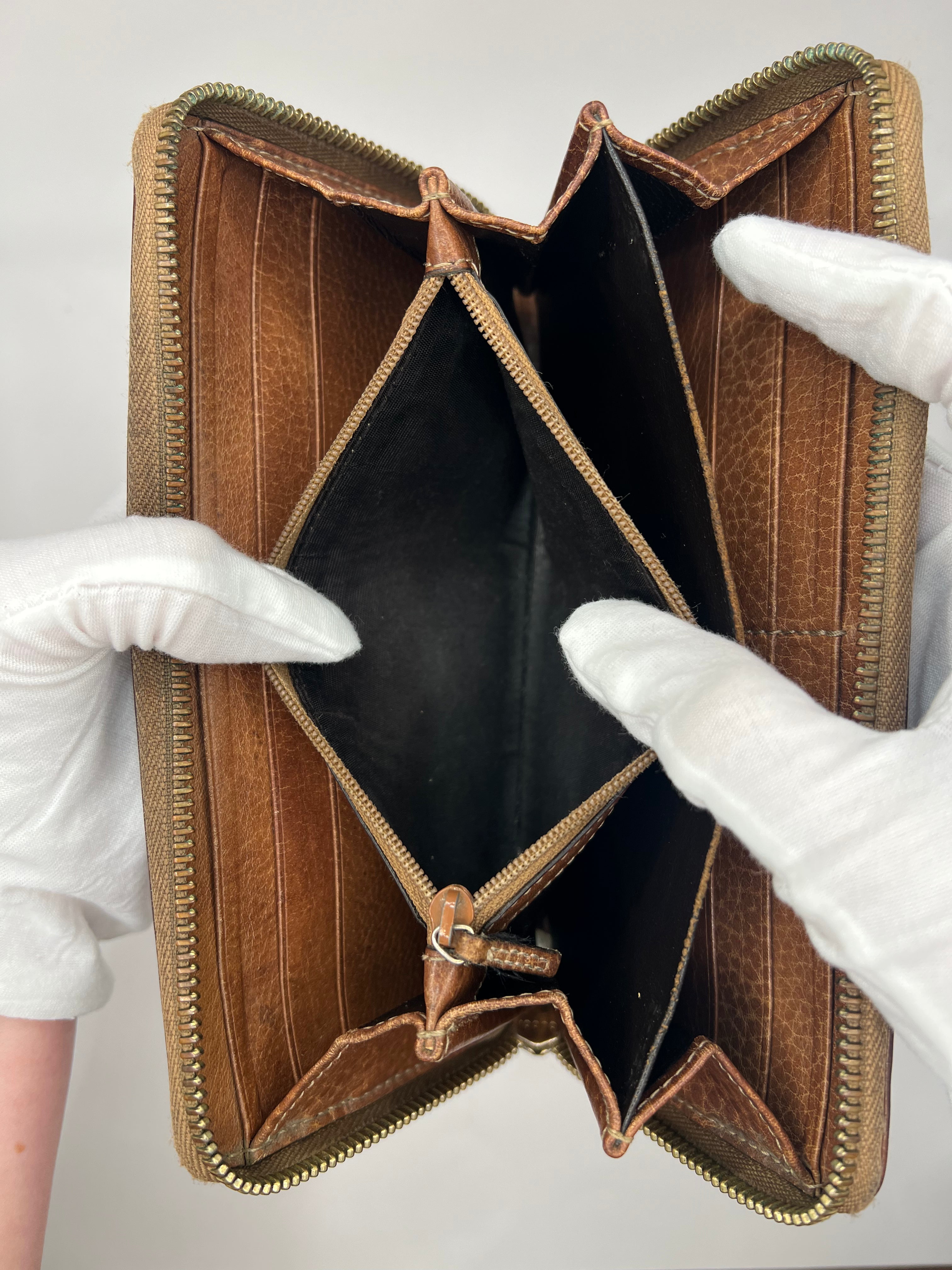 Gucci Guccissima Leather Zip-Around Wallet with bamboo tassel pull